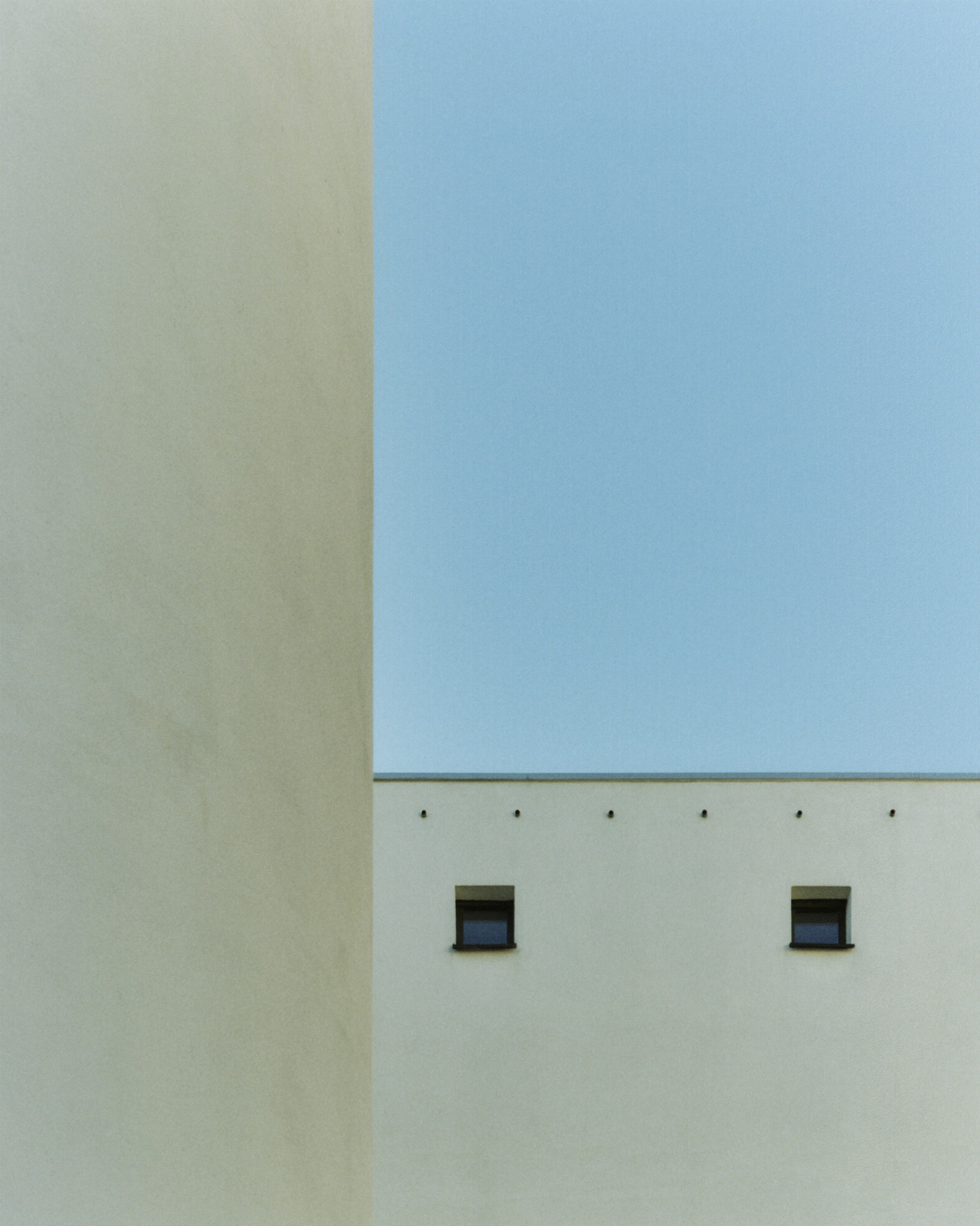 Finnish Embassy architecture in Stockholm framed against a blue sky