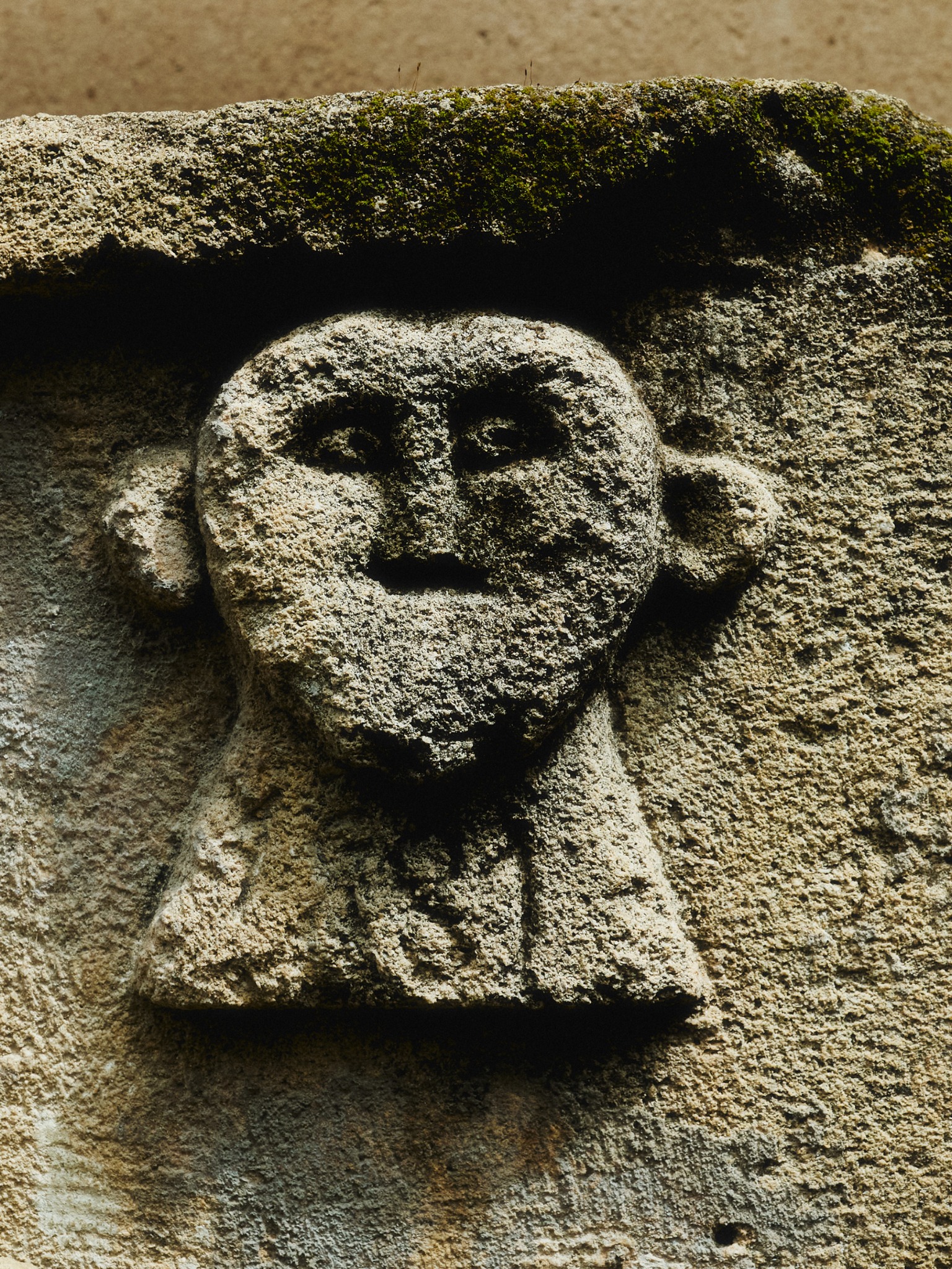 Carved stone face on a wall in Nicosia